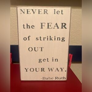 Collins’ white black wooden babe Ruth quote decoration